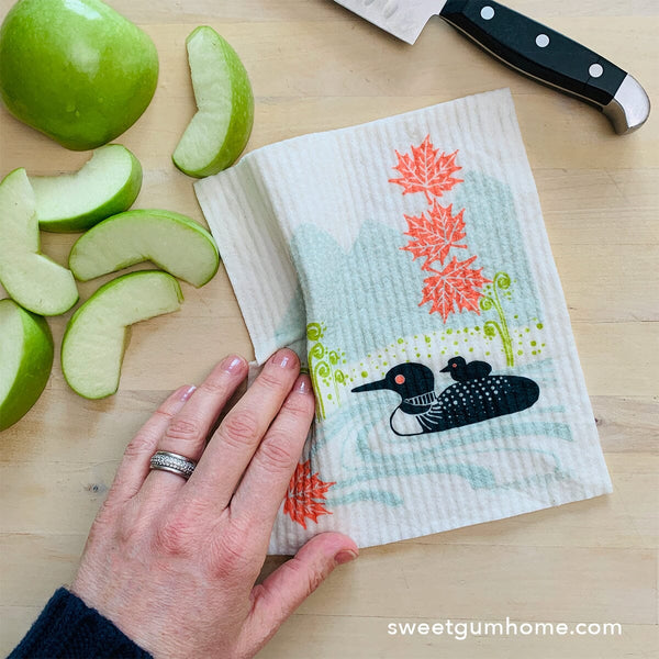 http://sweetgumhome.com/cdn/shop/products/loons-on-the-lake-swedish-dishcloth-swedish-dishcloths-sweetgum-textiles-company-llc-166490_600x.jpg?v=1690427717