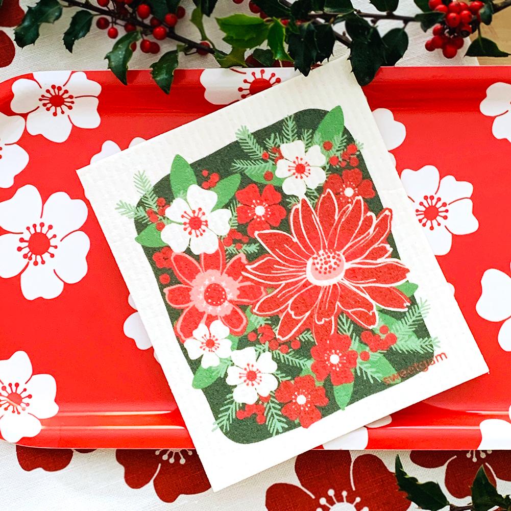 https://sweetgumhome.com/cdn/shop/products/christmas-flowers-swedish-dishcloth-pink-red-green-sweetgum-swedish-dishcloths-sweetgum-textiles-company-llc-646177_1200x.jpg?v=1670168201