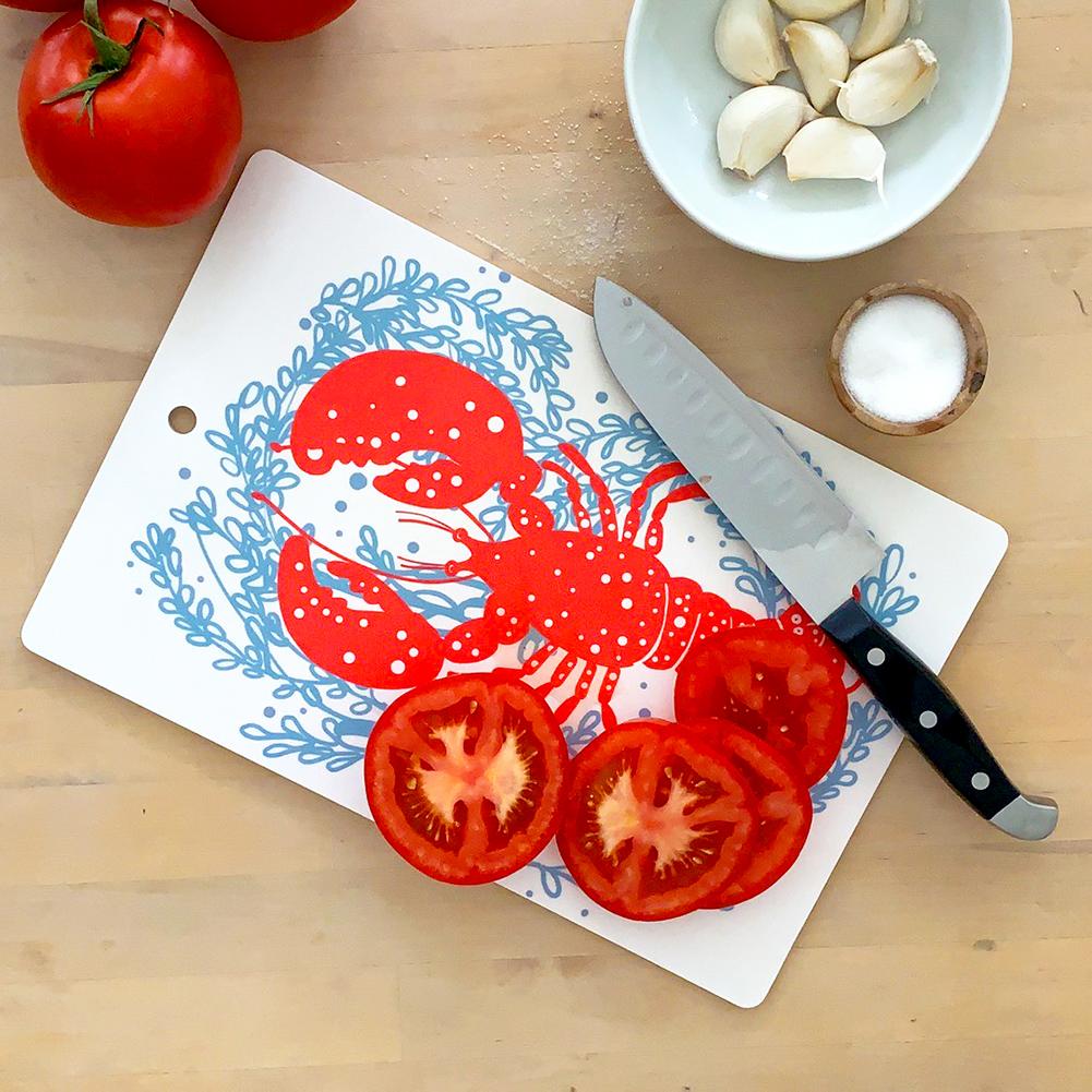 https://sweetgumhome.com/cdn/shop/products/cutting-board-lobster-red-plywood-melamine-sweetgum-textiles-company-llc-395477_1200x.jpg?v=1606171250