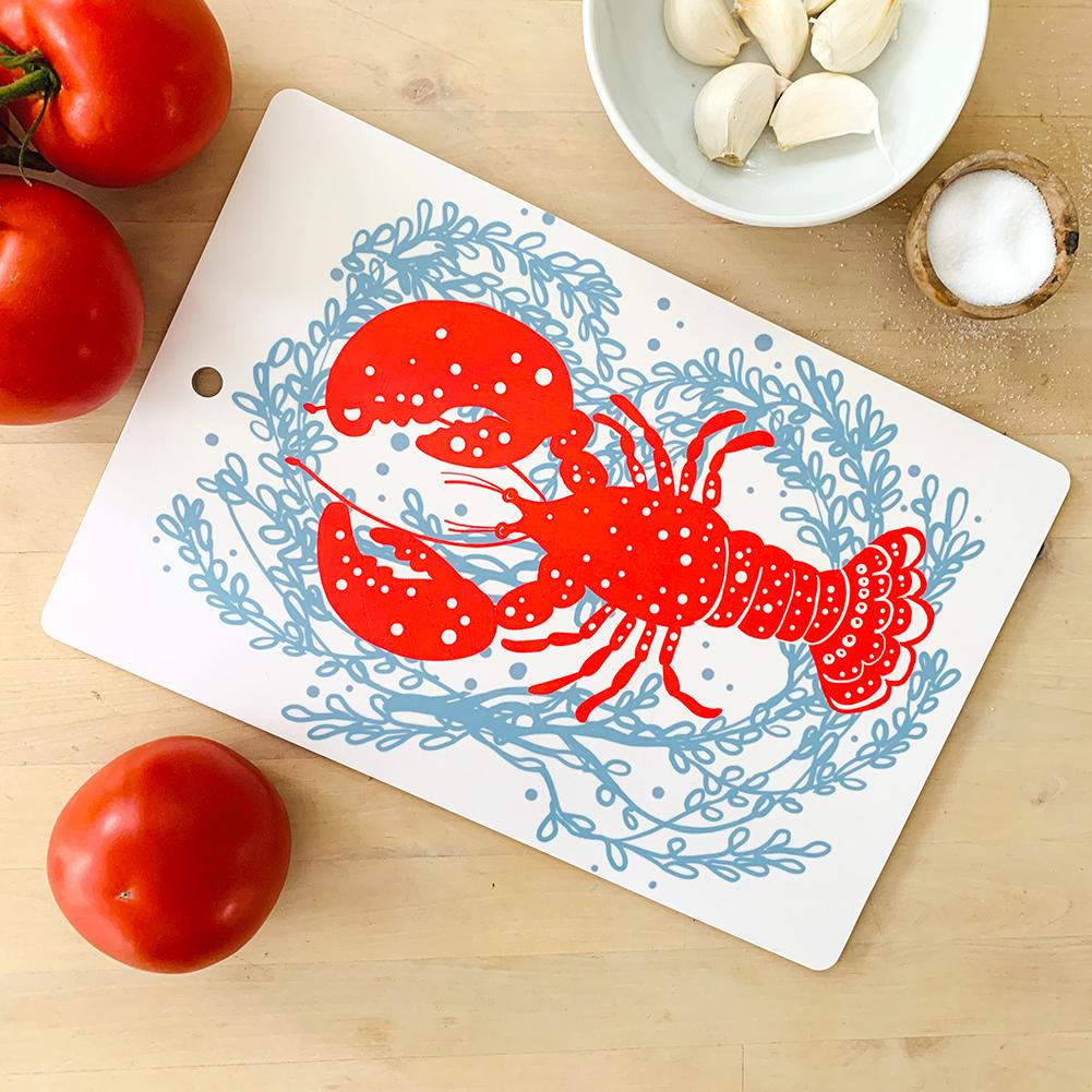 https://sweetgumhome.com/cdn/shop/products/cutting-board-lobster-red-plywood-melamine-sweetgum-textiles-company-llc-878547_1001x.jpg?v=1606183908