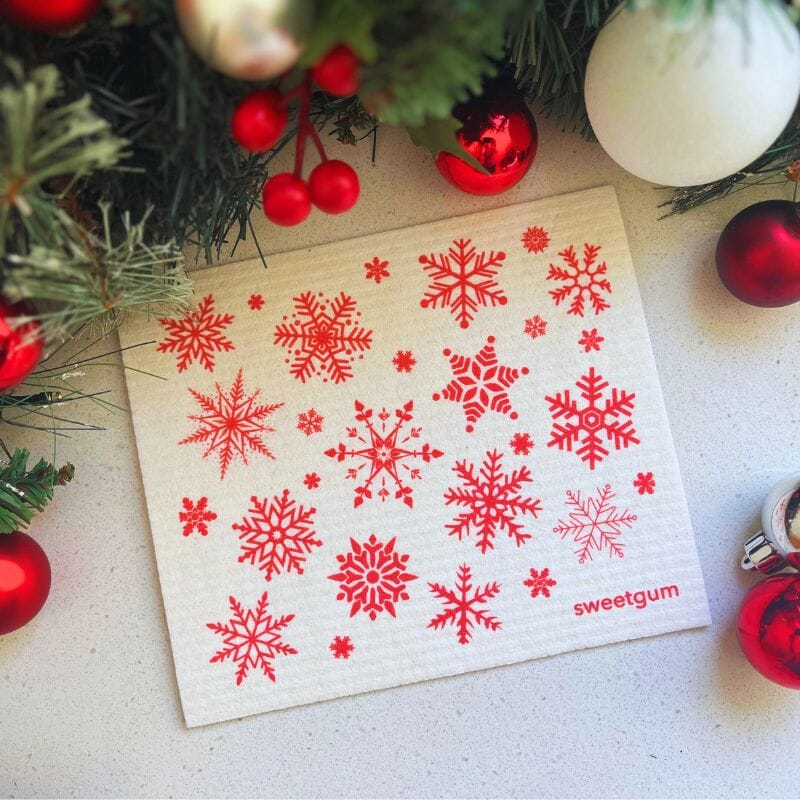 https://sweetgumhome.com/cdn/shop/products/red-white-nordic-snowflakes-swedish-dishcloth-swedish-dishcloths-sweetgum-textiles-company-llc-797865_1600x.jpg?v=1696090711